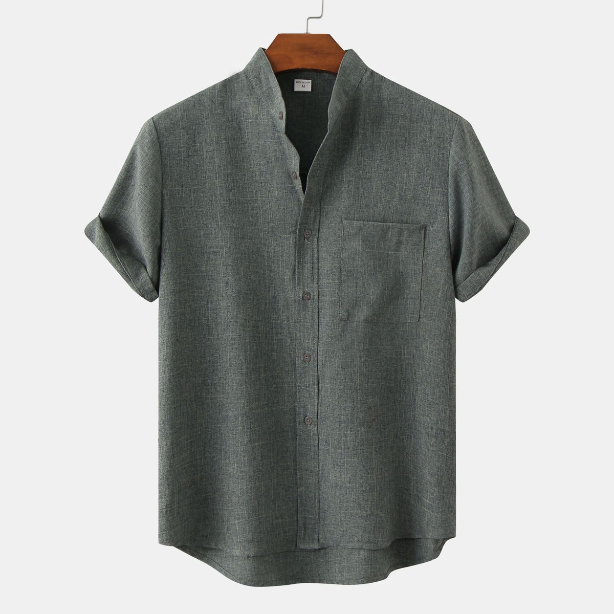 Camisa de algodón lisa con botones